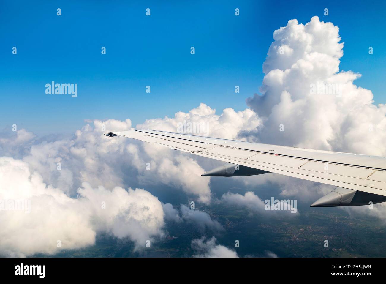 Airplane flying above glass hi-res stock photography and images - Alamy