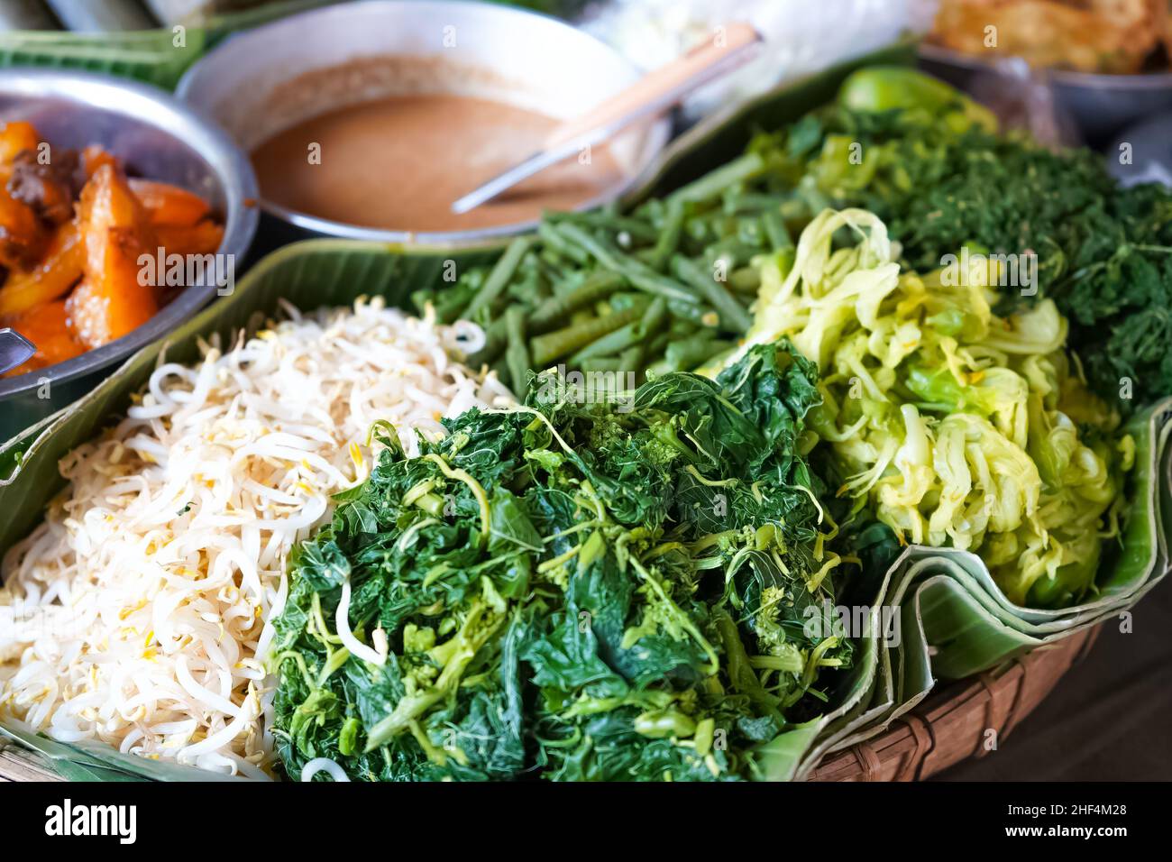 Vegetable pecel is a traditional food, especially in East Java. With a ...