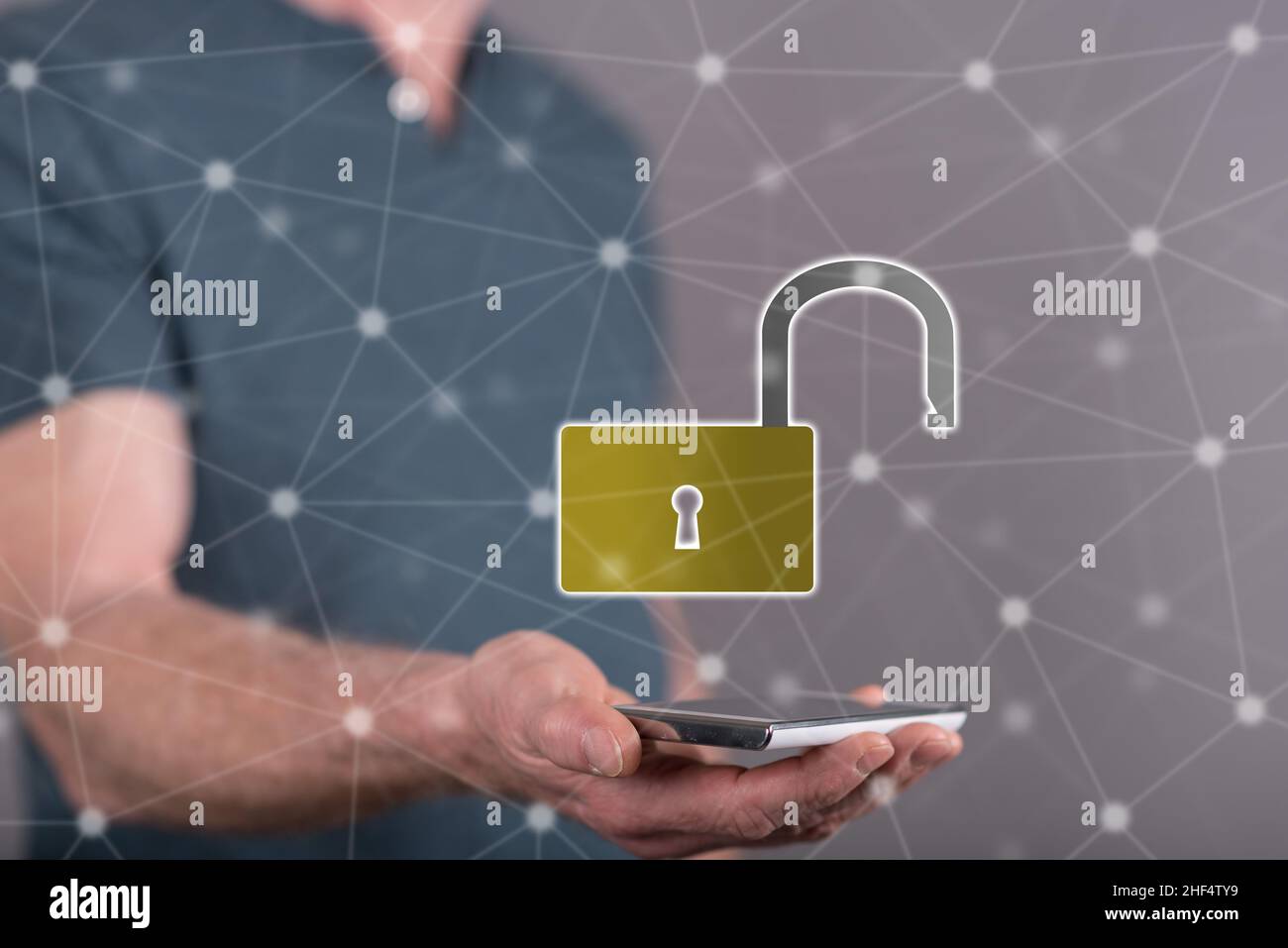 Cyber security concept above a smartphone held by a man in background ...