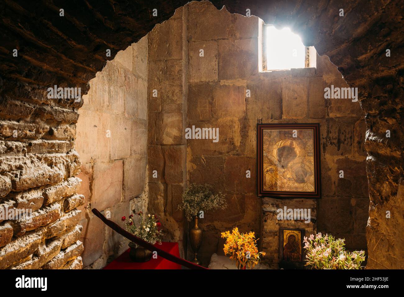 Mtskheta Georgia. View Through Arch To Icon Of Theotokos Under Window In Interior Of Jvari Church Stock Photo