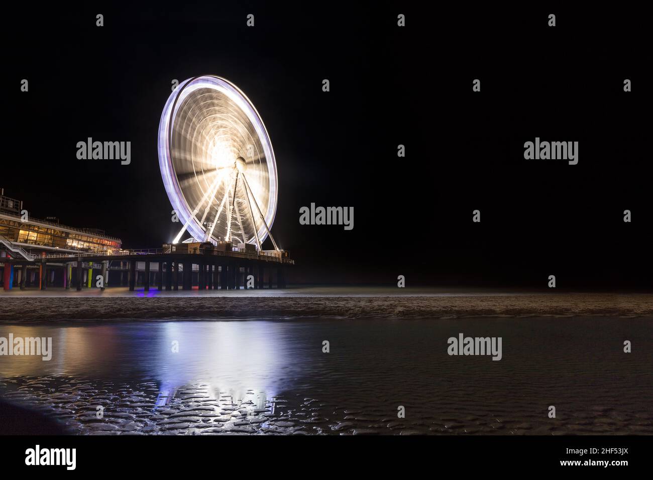 The Pier in Scheveningen beach in Den Haag, Netherlands at night Stock Photo