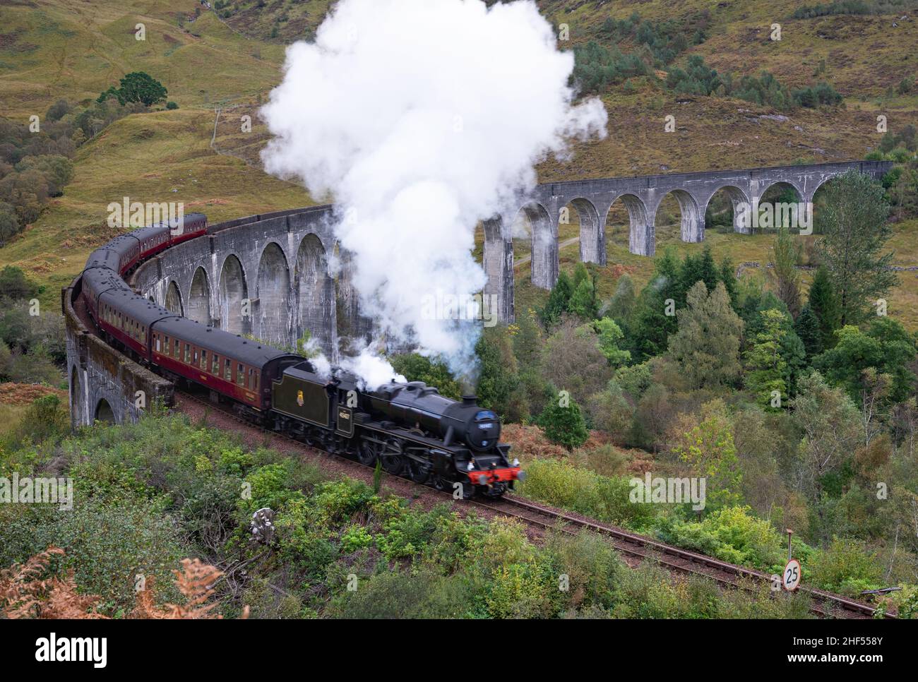 Glenfinnan, UK - 4 October, 2019. The Jacobite Steam Train and Glenfinnan viaduct in Scotland Highland, UK Stock Photo