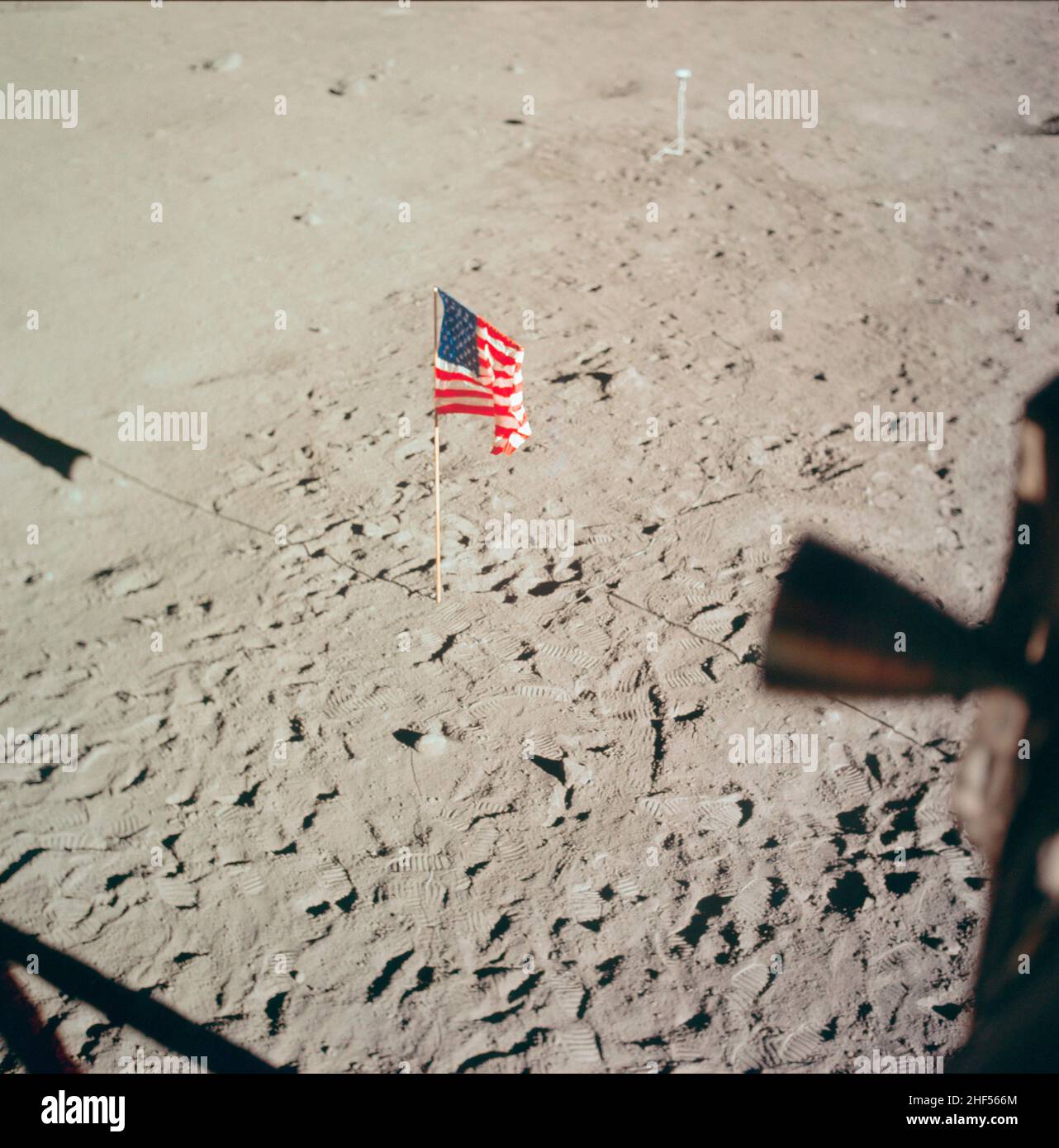 The flag of the United States and the footprints of astronauts Neil A. Armstrong and Edwin E. Aldrin Jr., deployed on the surface of the moon. Apollo. Stock Photo