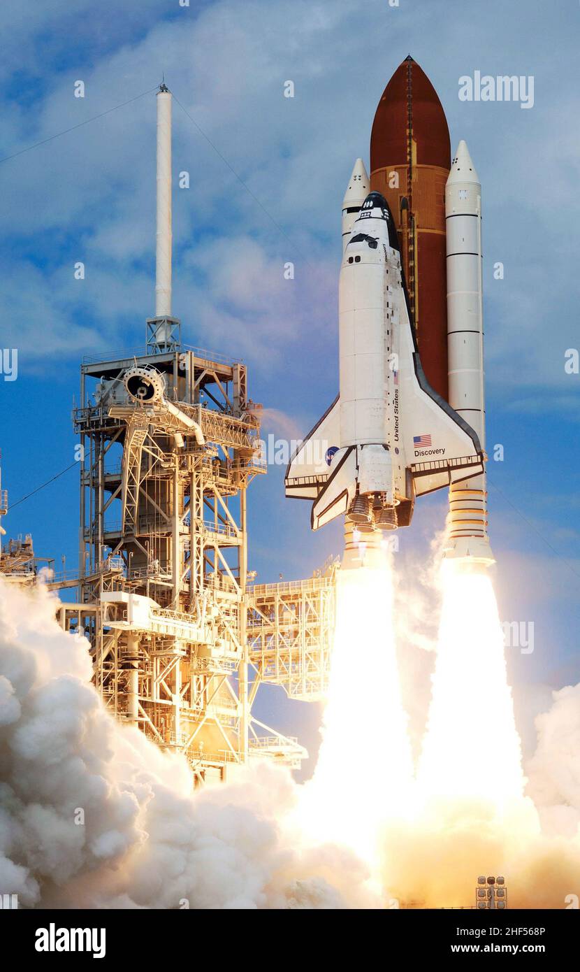 The Space Shuttle Discovery and its seven-member STS-120 crew head toward Earth-orbit. Liftoff from Kennedy Space Center 2007. Stock Photo