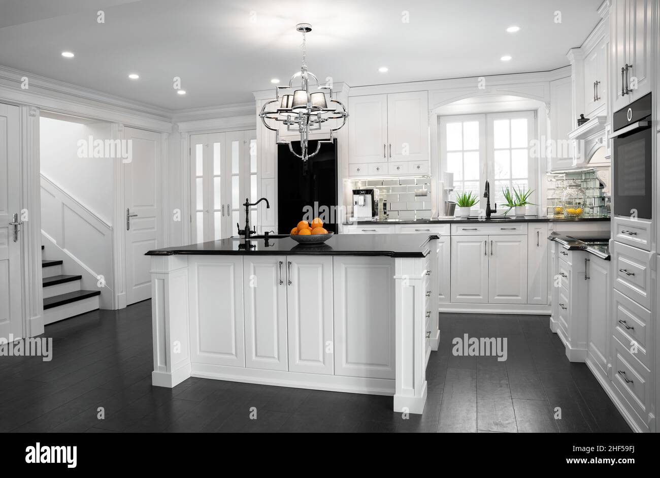 Beautiful, hampton style, wooden kitchen with large island Stock Photo