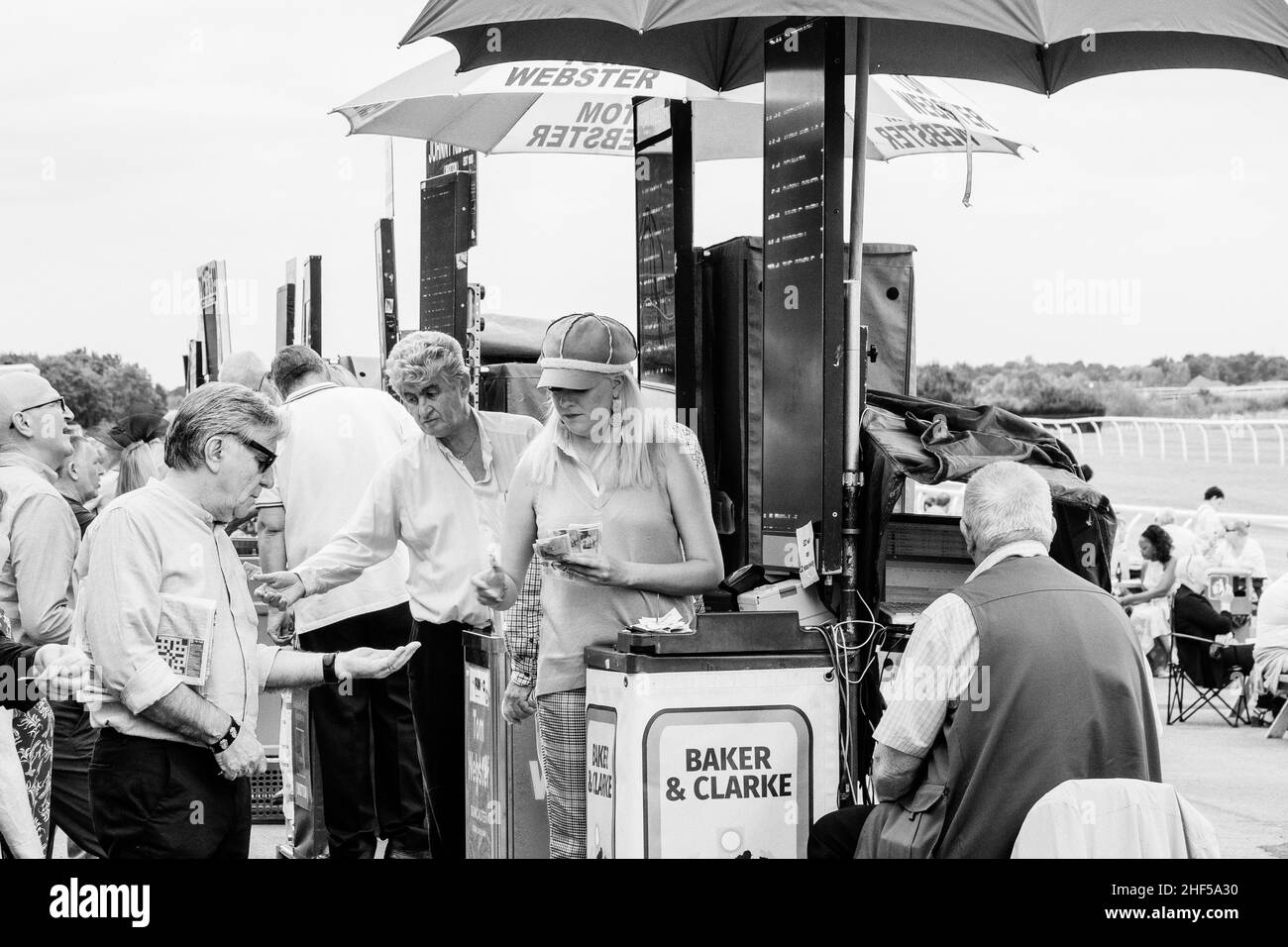 Collecting Winnings, Catterick Races, North Yorkshire Stock Photo