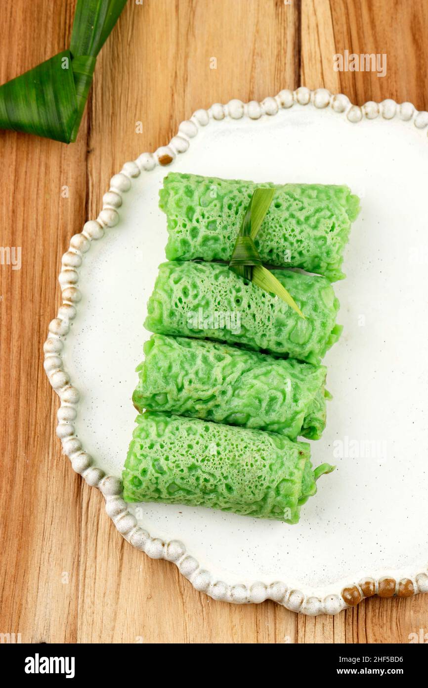 Dadar Gulung, Indonesian Snack Dessert Made from Rice Flour Crepes with Shredde Coconut and Palm Sugar Inside. Popular in Malaysia, Indonesia, and Sin Stock Photo