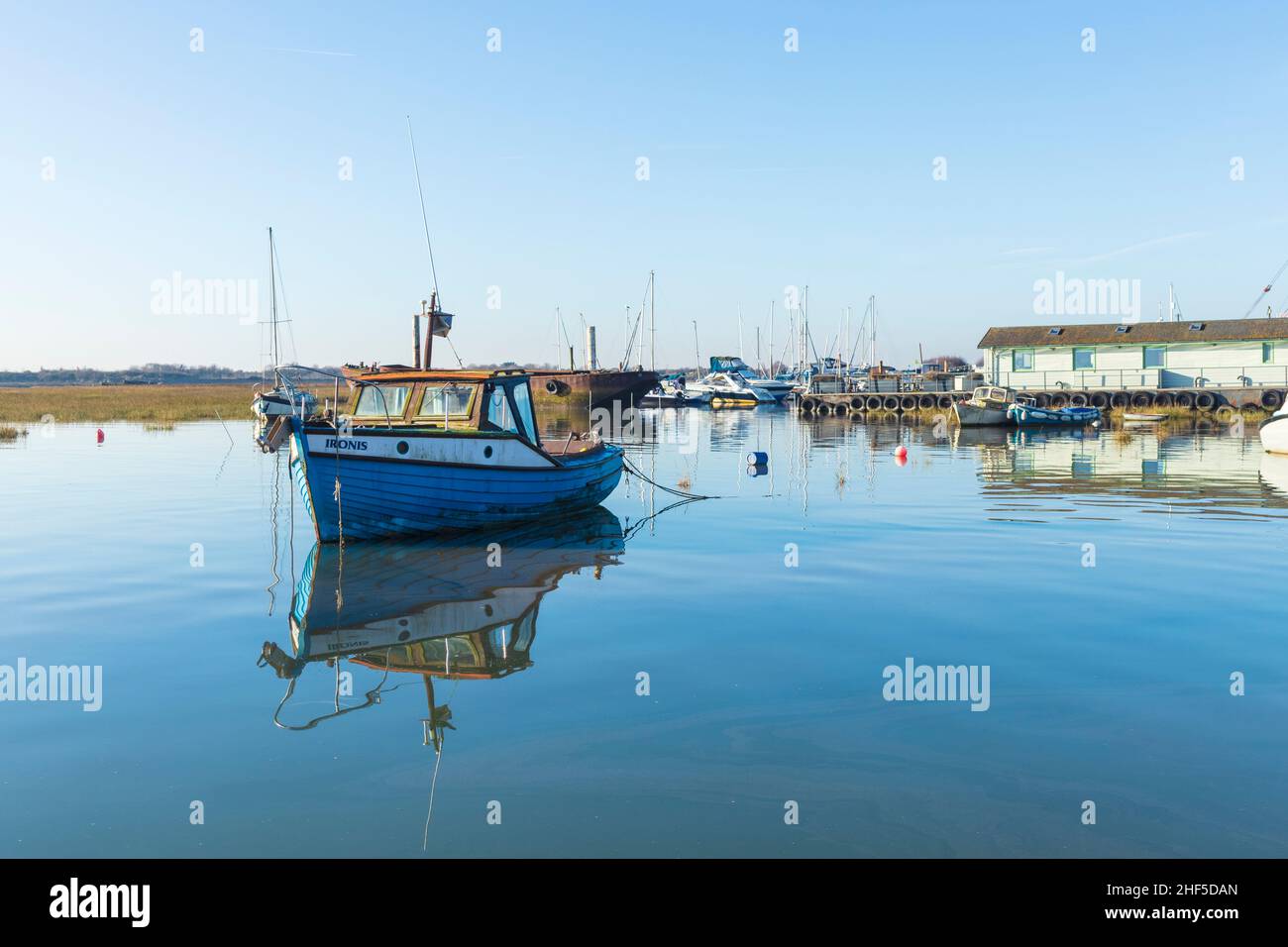 Boats Moored at Old Leigh on a Bright and Cloudless January Morning Stock Photo