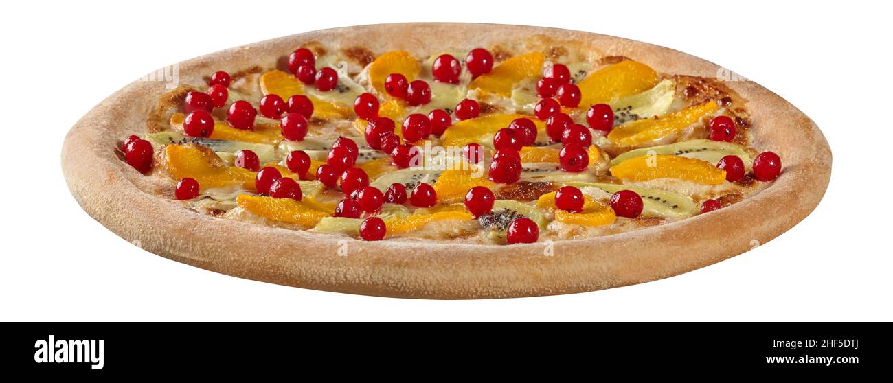 Fruit pizza with cream cheese sauce, condensed milk, peaches, kiwi and red currants Stock Photo