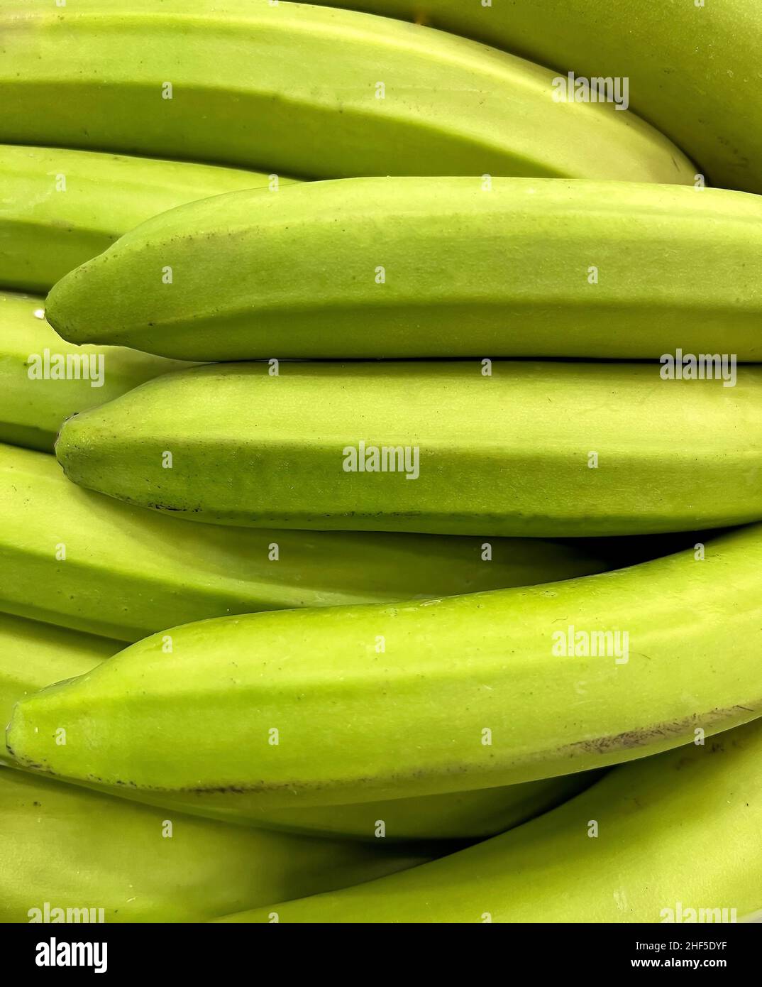 Fresh green bananas in the store Stock Photo Alamy