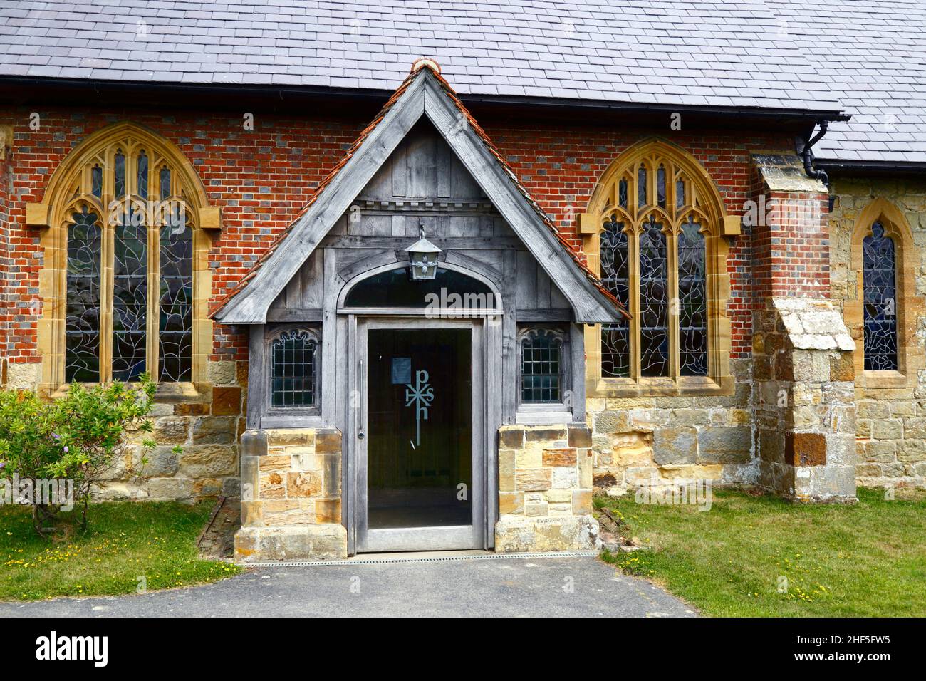 Detail of entrance porch of the historic All Saints church in Tudeley village, Kent, England Stock Photo