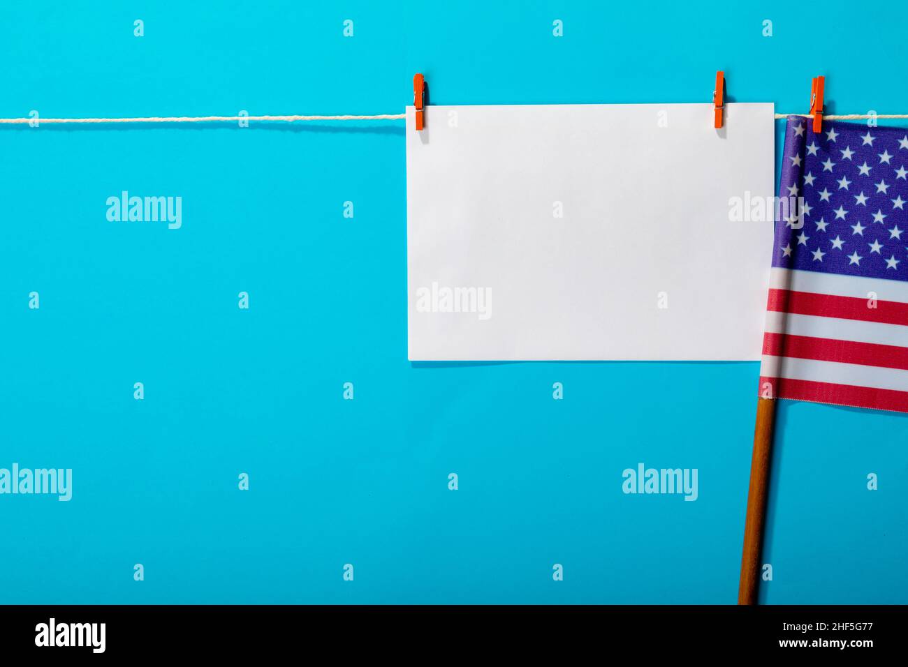 American flag on clothesline hi-res stock photography and images - Alamy, image size:1300x956