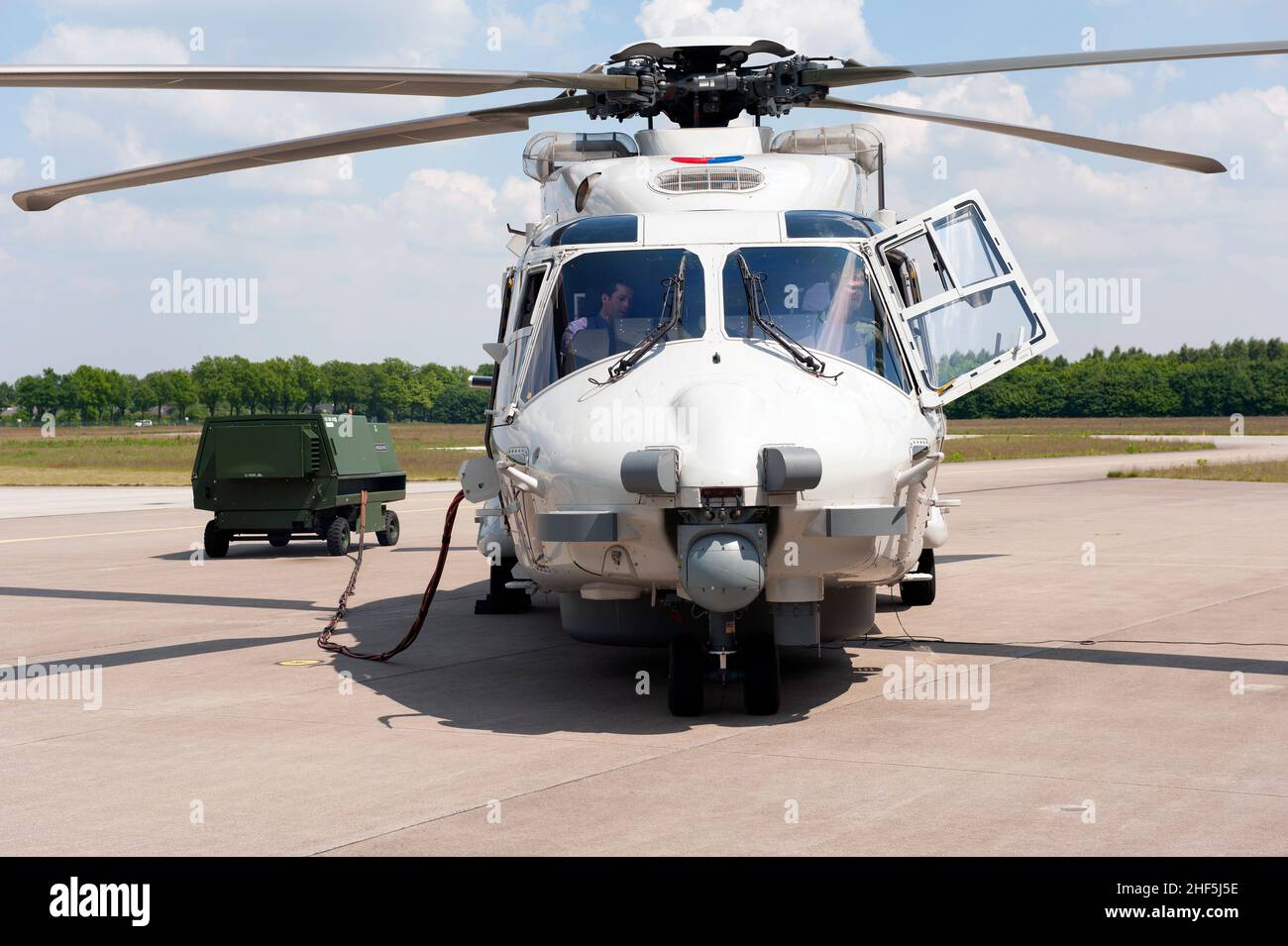 Gilze-Rijen, Netherlands. A NH-90 Helicopter parked outside it's Hangar at the Dutch Airforce Airbase, waiting to be deployed on a mission. Stock Photo