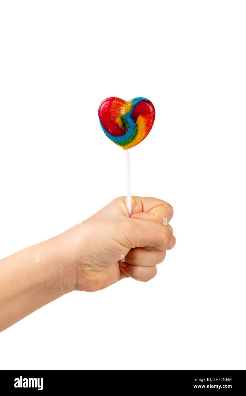 Heart shaped lollipop on white background Stock Photo