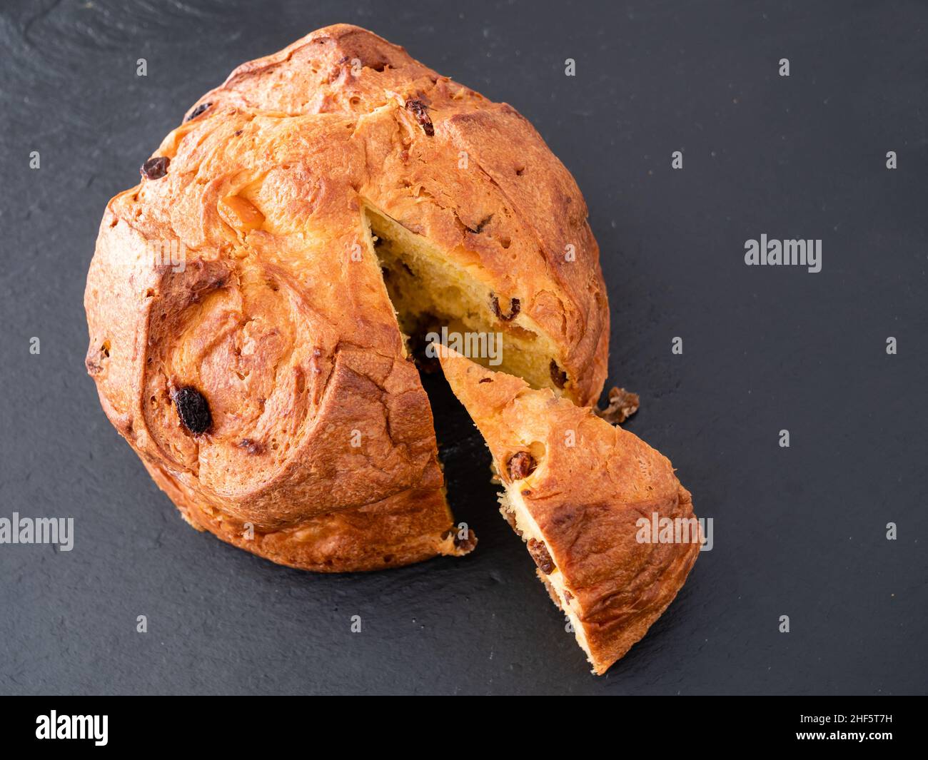 Panettone Italian Sponge Cake or Sweet Bread Slice from Milan, Served Traditionally for Christmas Stock Photo