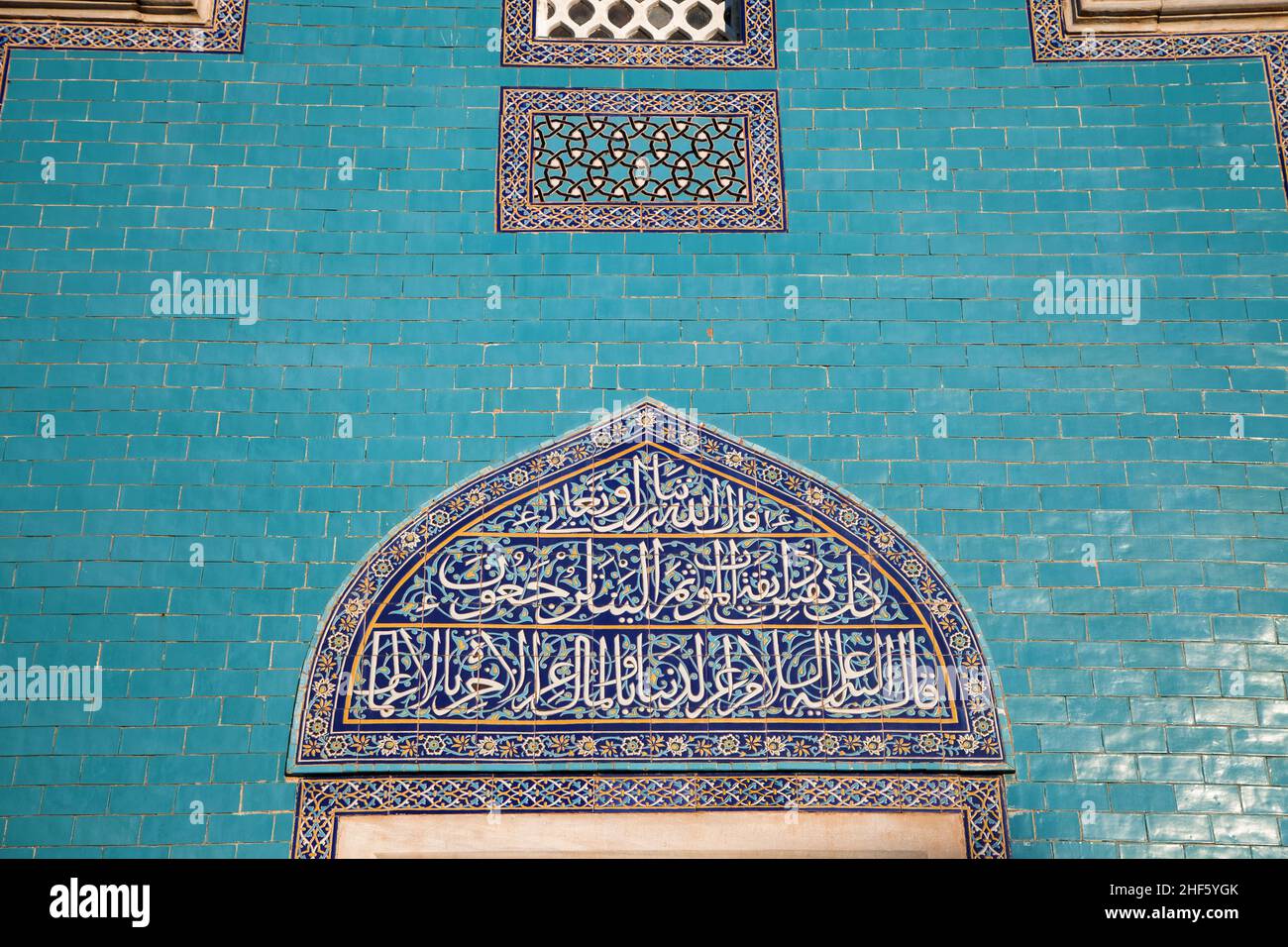 Green tomb with iznik pottery or tiles covered tomb wall. Stock Photo