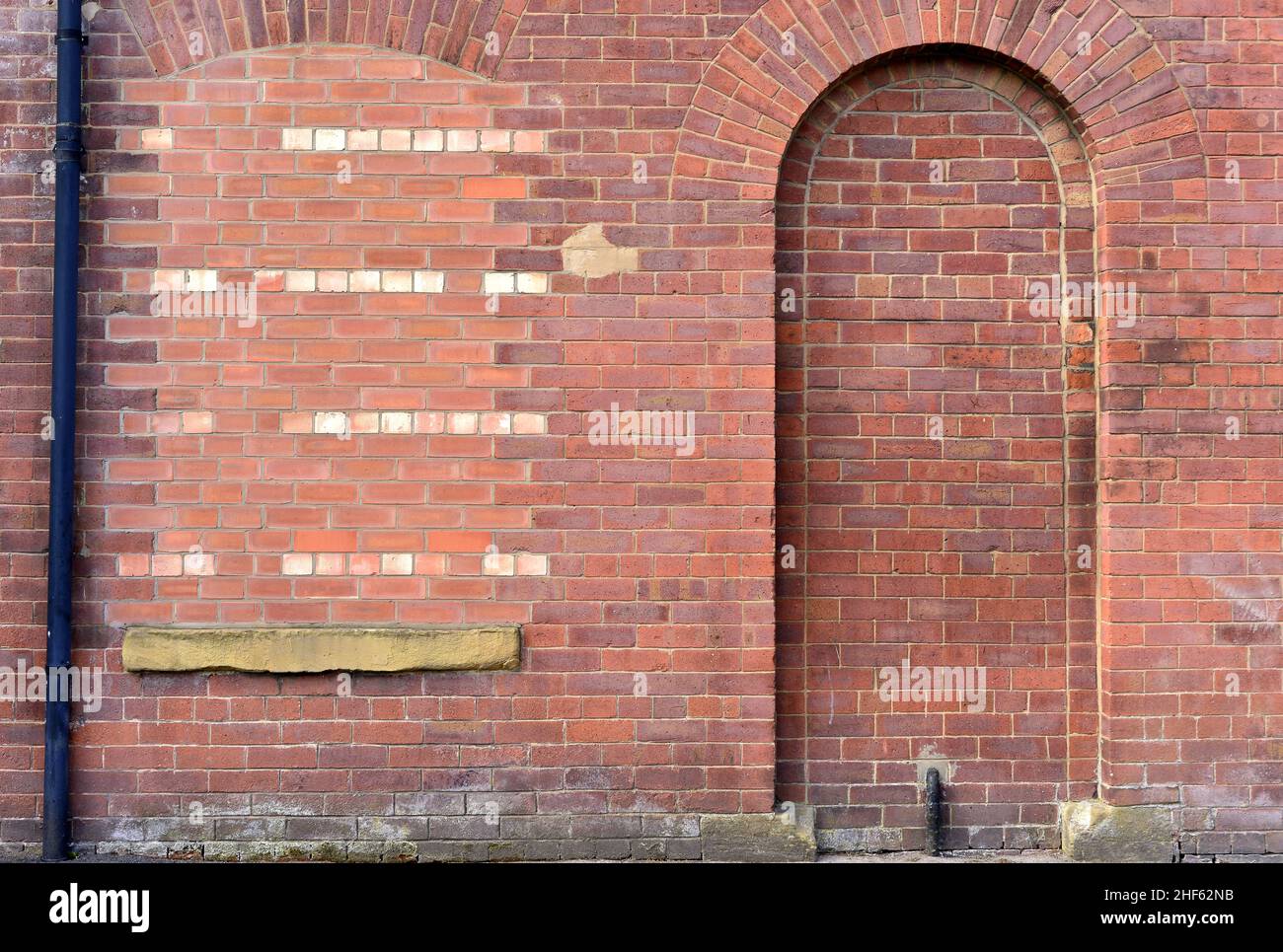 Bricked up doorway & window in Oldham, Greater Manchester, UK Stock ...