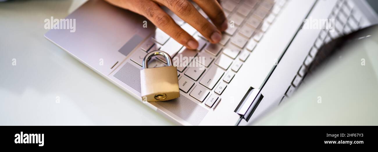 Laptop Data Privacy And Computer Cyber Security Risk Stock Photo