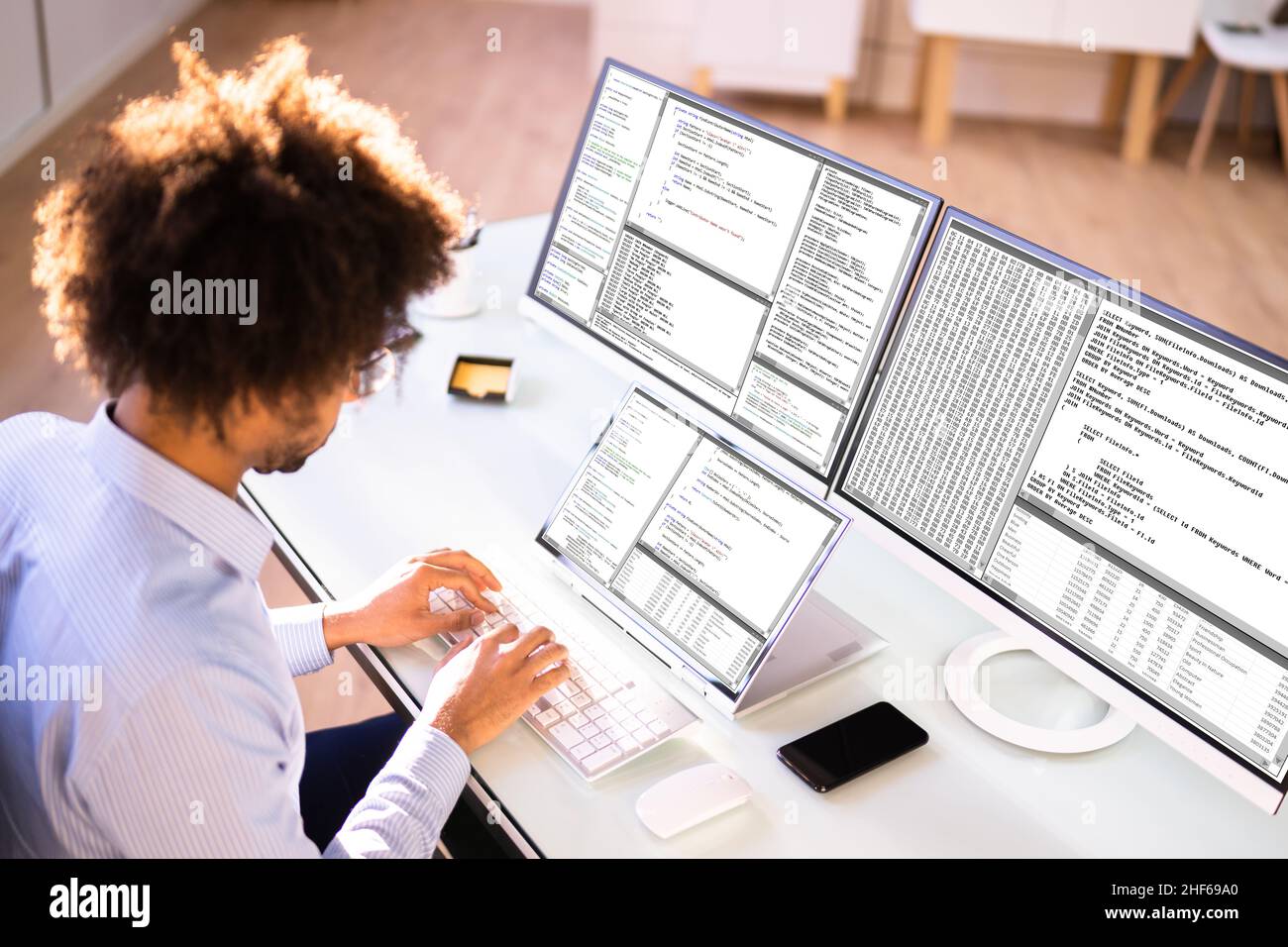 African American Programmer Man Coding On Computer Stock Photo - Alamy
