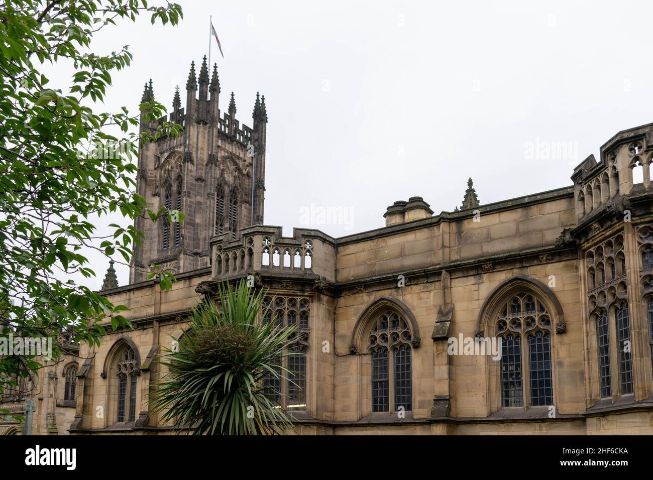 Manchester Cathedral exterior façade background. Landmark in city centre, UK. Gothic architecture, historical building, religious church concept, beau Stock Photo