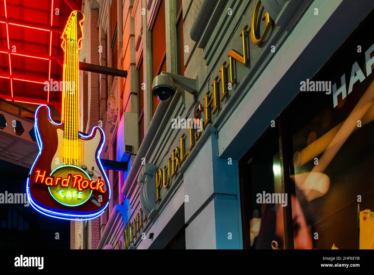 Manchester, UK - 22nd September 2019: Hard Rock Café vibrant neon Guitar sign at the entrance to the Hardrock café pub and cocktail bar and restaurant Stock Photo