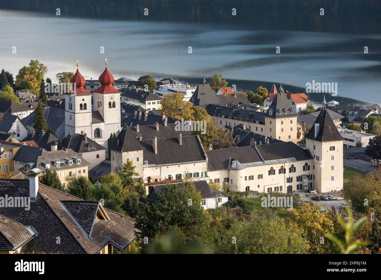 View of Millstatt Abbey and Lake Millstatt,  Millstatt am See,  Spittal an der Drau District,  Carinthia,  Austria,  Europe Stock Photo