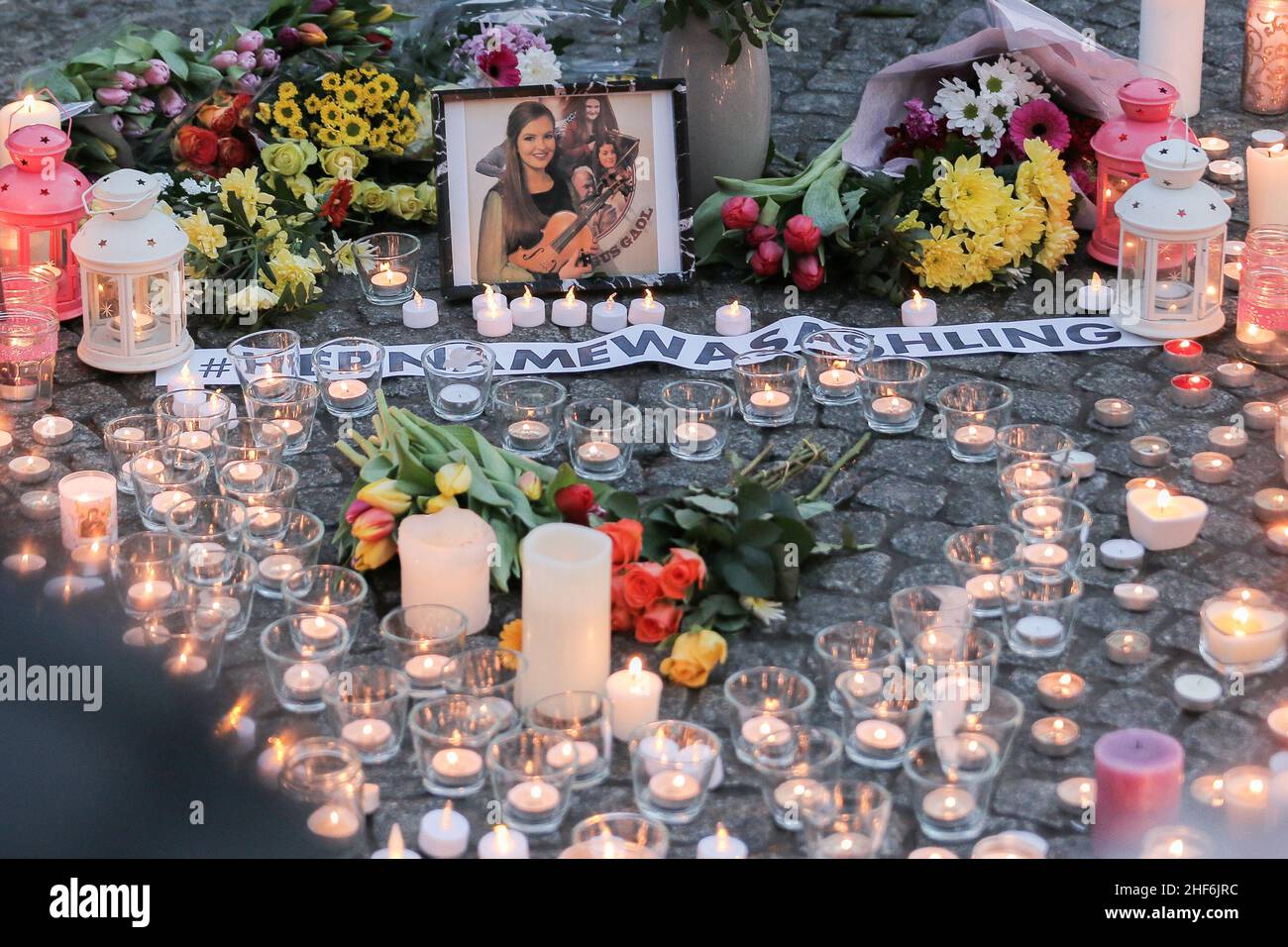Belfast, UK. 14th Jan, 2022. 14th January, 2022, Belfast City Hall. A candlelit display for 23 year old Ashling Murphy who was killed in County Offaly. Credit: Pathos Images/Alamy Live News Stock Photo