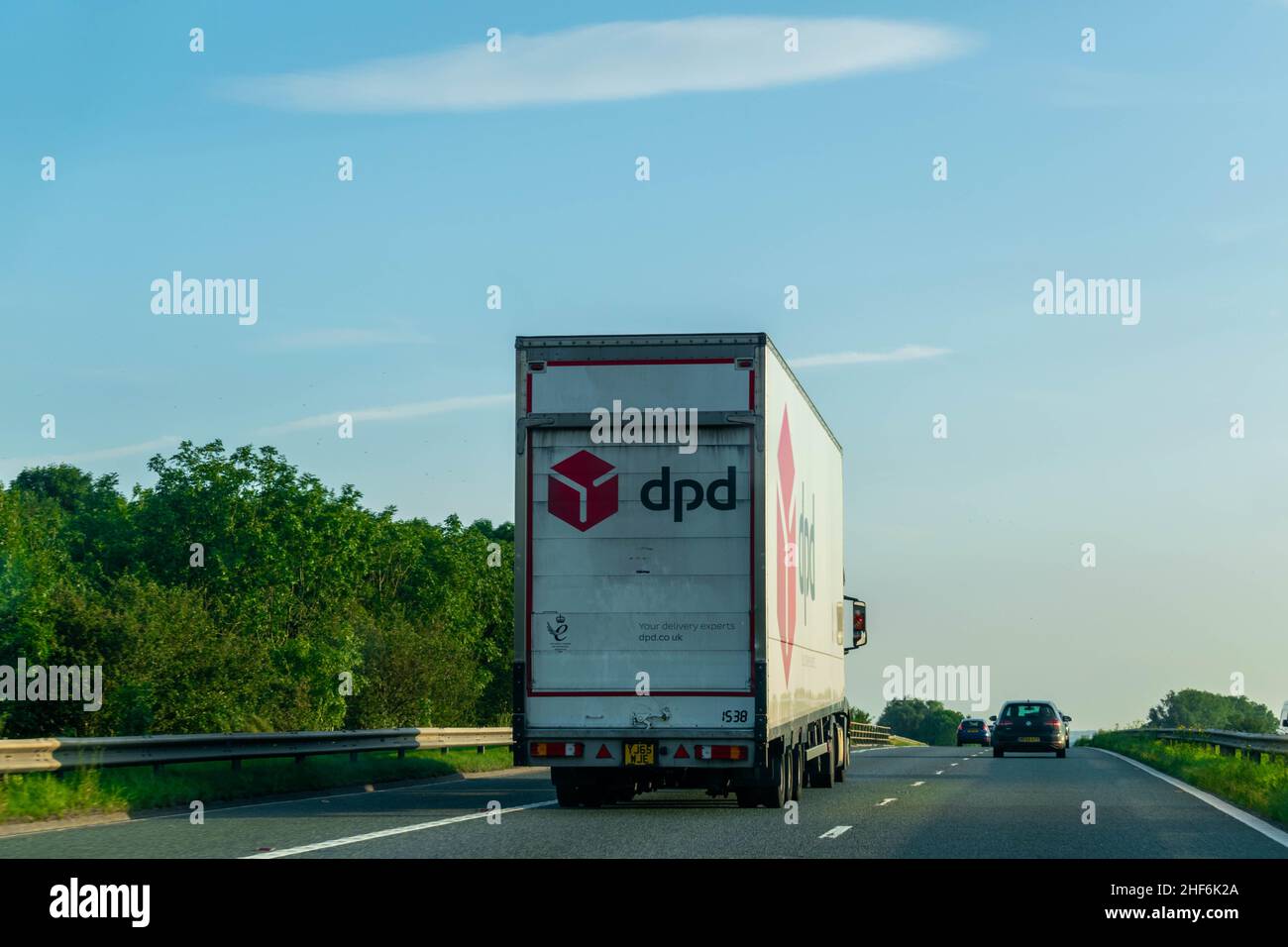 Durham, UK - 23rd August 2019: DPD group, lorry driving down a British motorway. French multinational courier delivery services. Delivery parcel posta Stock Photo