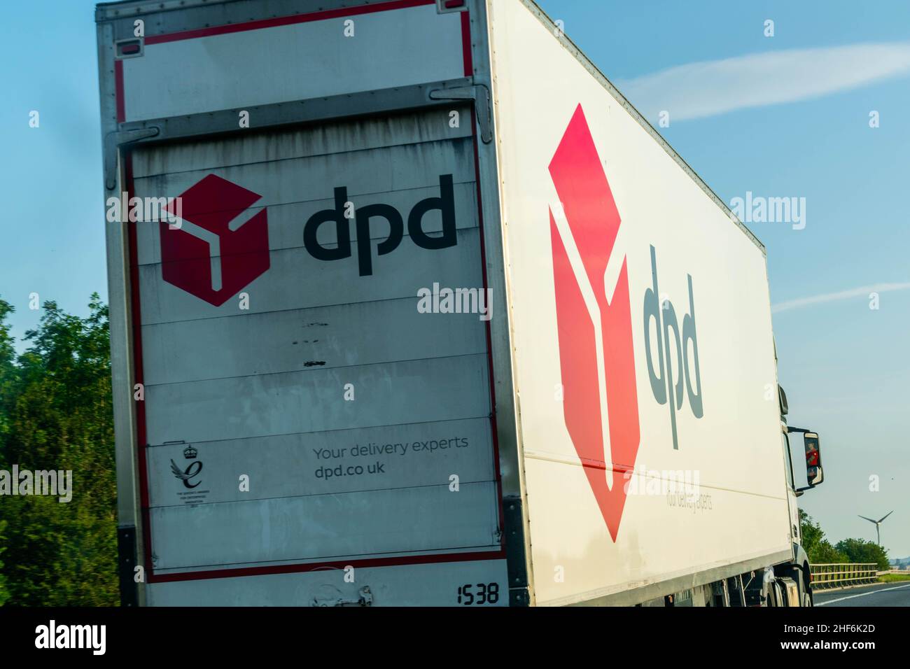 Durham, UK - 23rd August 2019: DPD group, lorry driving down a British motorway. French multinational courier delivery services. Delivery parcel posta Stock Photo