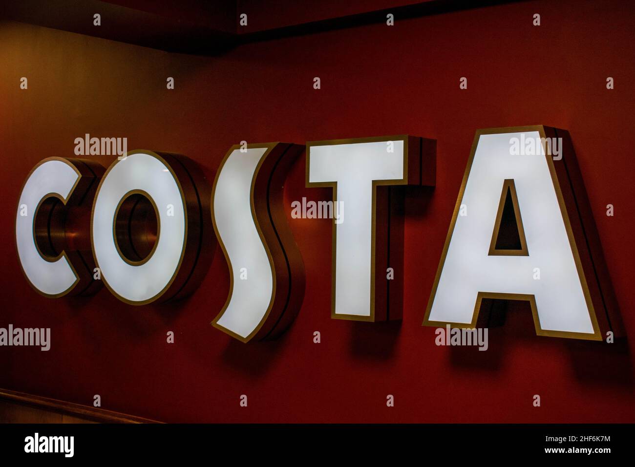 Durham, UK - 23rd August 2019: Costa Coffee illuminated advertising inside a coffeehouse. The brand was founded in London in 1971 by the Costa family. Stock Photo