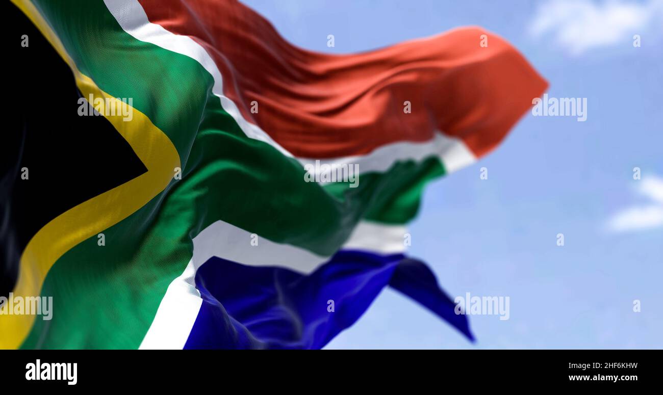 Detailed close up of the national flag of South Africa waving in the wind on a clear day. Democracy and politics. African country. Selective focus. Se Stock Photo