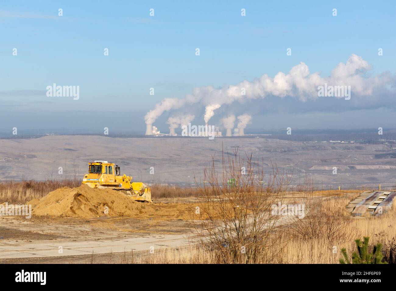 Bogatynia, Poland. 14th Jan, 2022. Vapor rises from the cooling towers of the PGE Turow Power Station attached to a coal open-pit mine operated in Bogatynia, Poland, on Friday, January 14, 2022. The European Court of Justice ordered to hold production of the Turow coal mine and pressure is put on Poland to use more clean energy. (Photo by Dominika Zarzycka/Sipa USA) Credit: Sipa USA/Alamy Live News Stock Photo