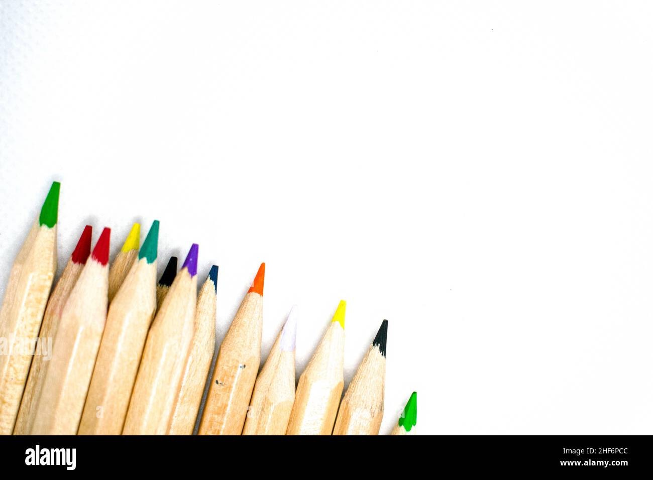 Back to school concept. Colourful vibrant pencils on a isolated white background and copy space. Stock Photo