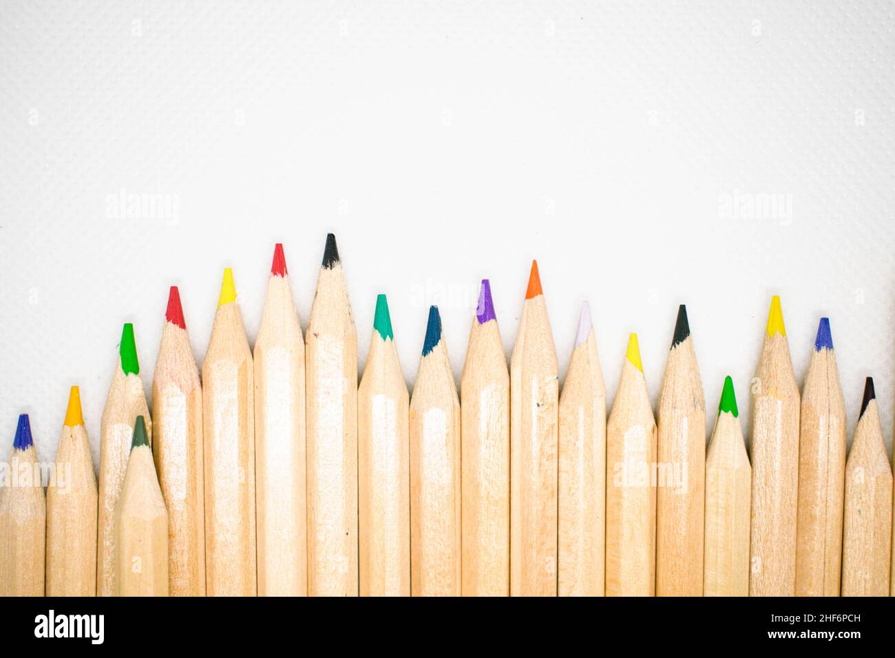 Back to school concept. Colourful vibrant pencils on a isolated white background and copy space. Stock Photo