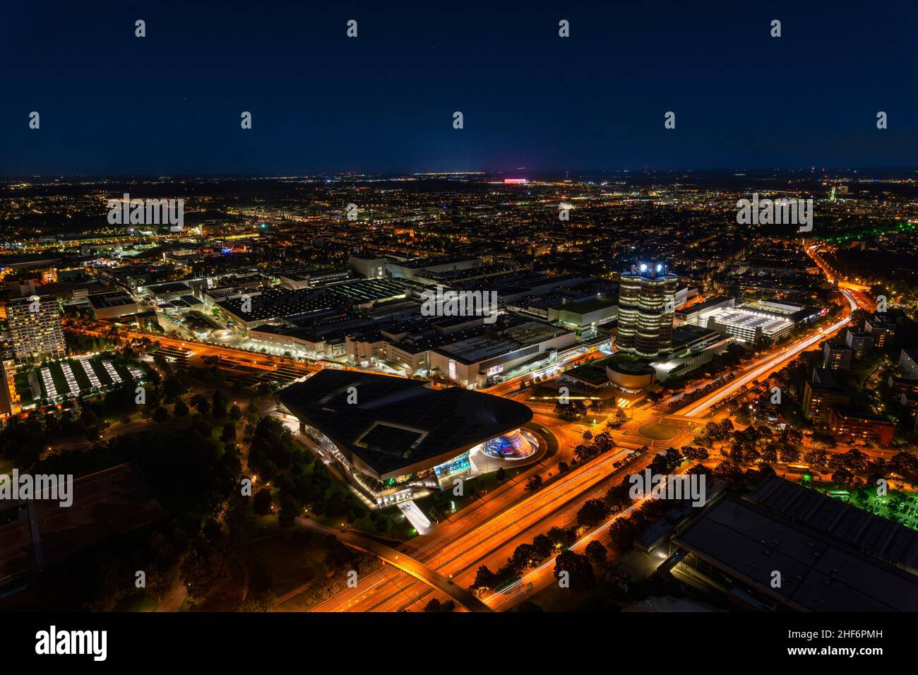 Munich from above at night,  fantastic view over the lights of the beautiful bavarian capital as wallpaper eyecatcher Stock Photo