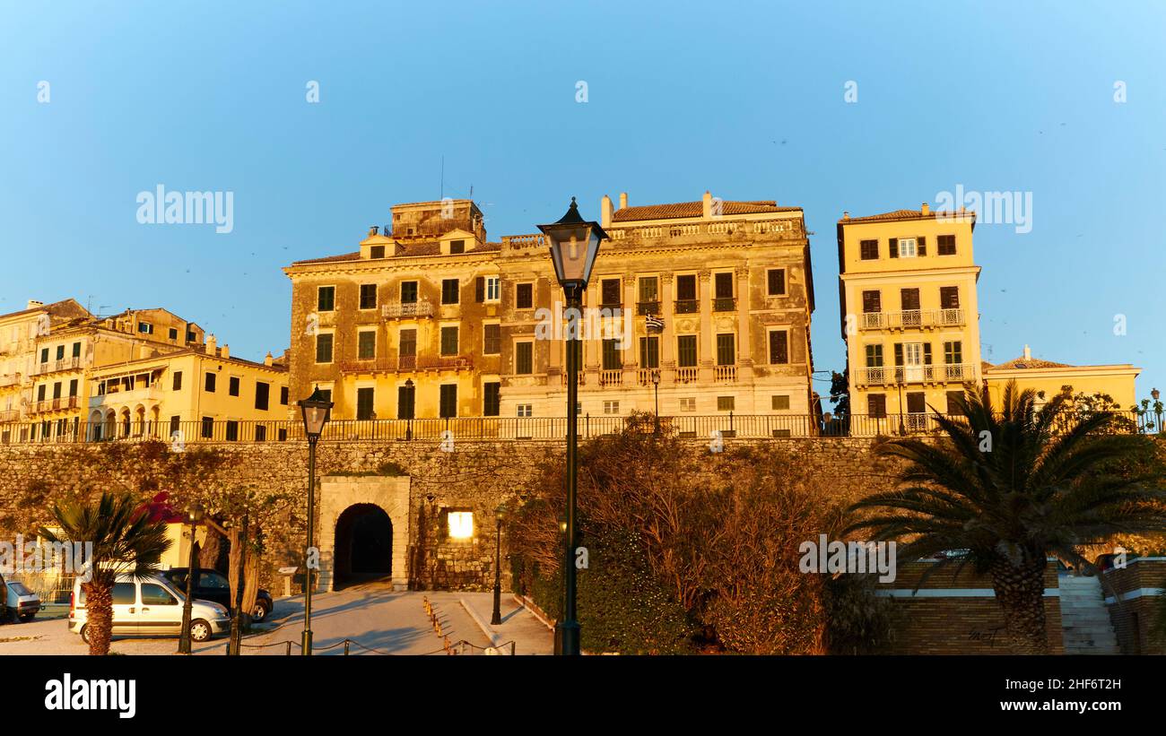 Greece,  Greek islands,  Ionian islands,  Corfu,  Corfu town,  old town,  morning light,  historical building complex on the edge of the old town,  below it tunnel,  in front of it in the middle street lamp,  not switched on Stock Photo