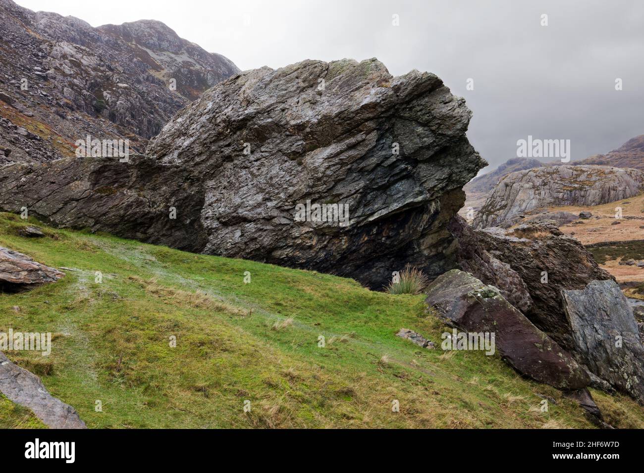 The Cromlech Boulders are a number of gigantic boulders in Llanberis Pass, Snowdonia. Stock Photo