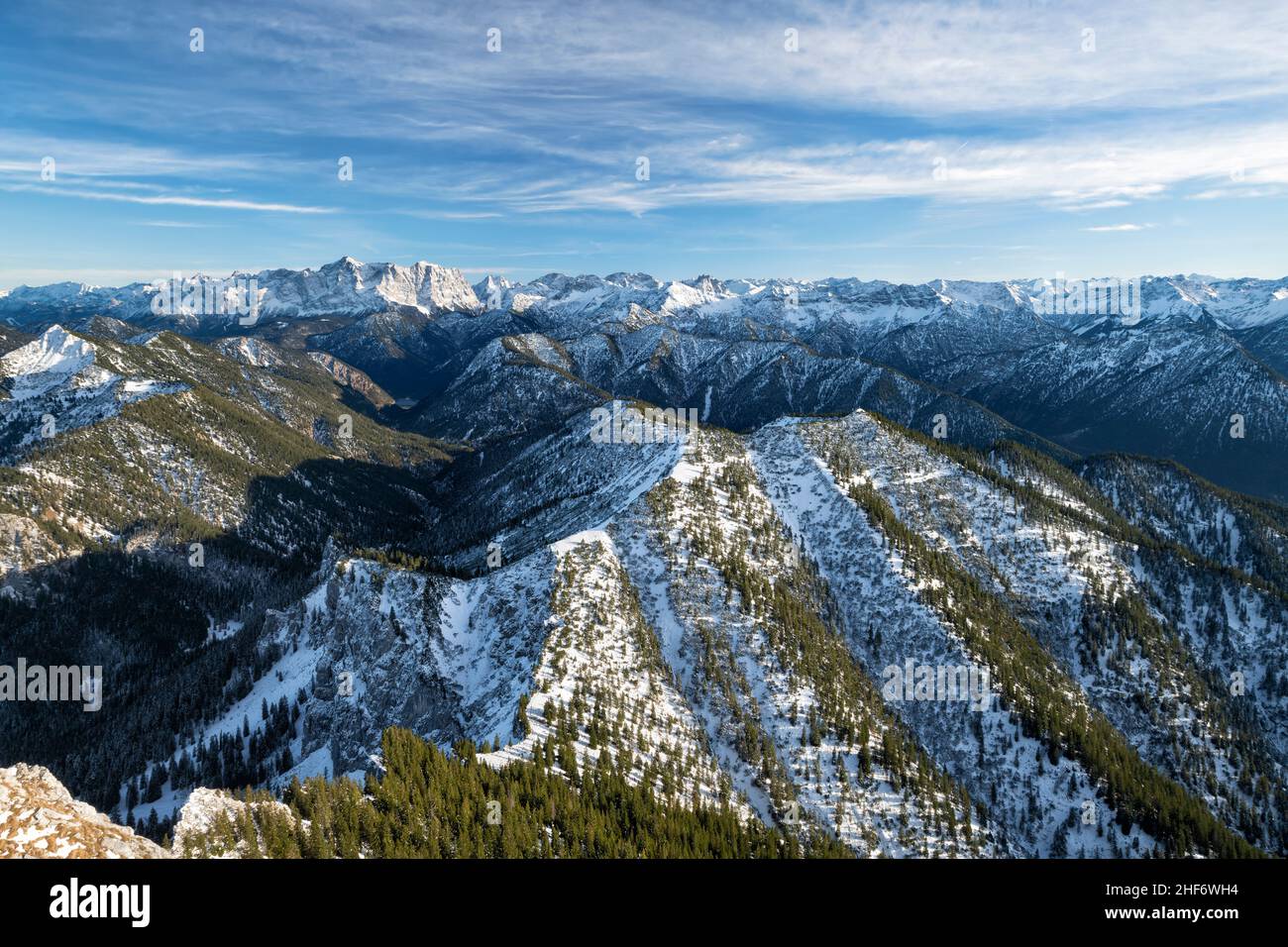 Early winter snowy alpine mountain landscape on a sunny autumn day ...