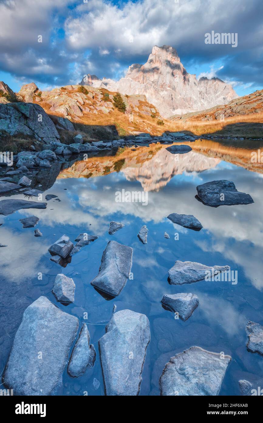 Cavallazza lakes in the Lagorai mountain ridge,  mont Cimon de la Pala (Dolomites) reflected in the water mirror in autumn,  rolle pass,  Trentino Alto Adige,  Italy Stock Photo
