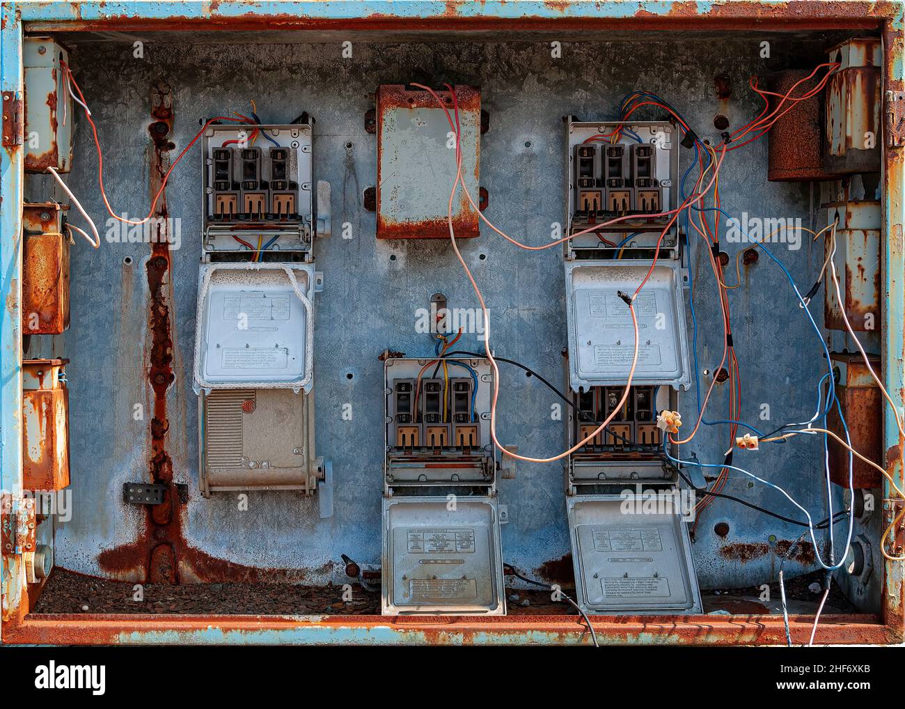 A broken fusebox from an abandoned industrial site. Stock Photo