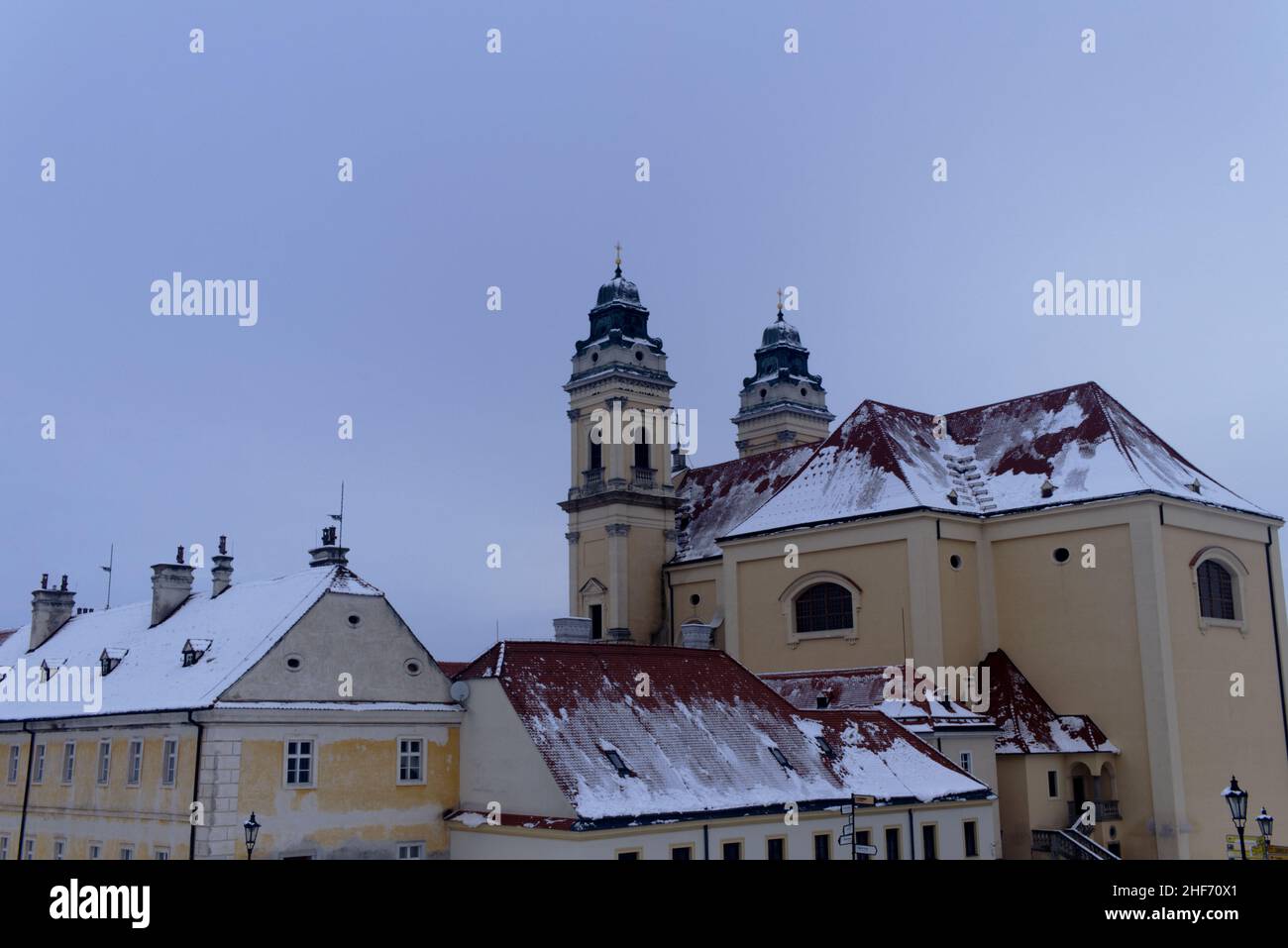 Church in Valtice, South Moravia, Czech Republic during winter - Valtice church covered with snow Stock Photo