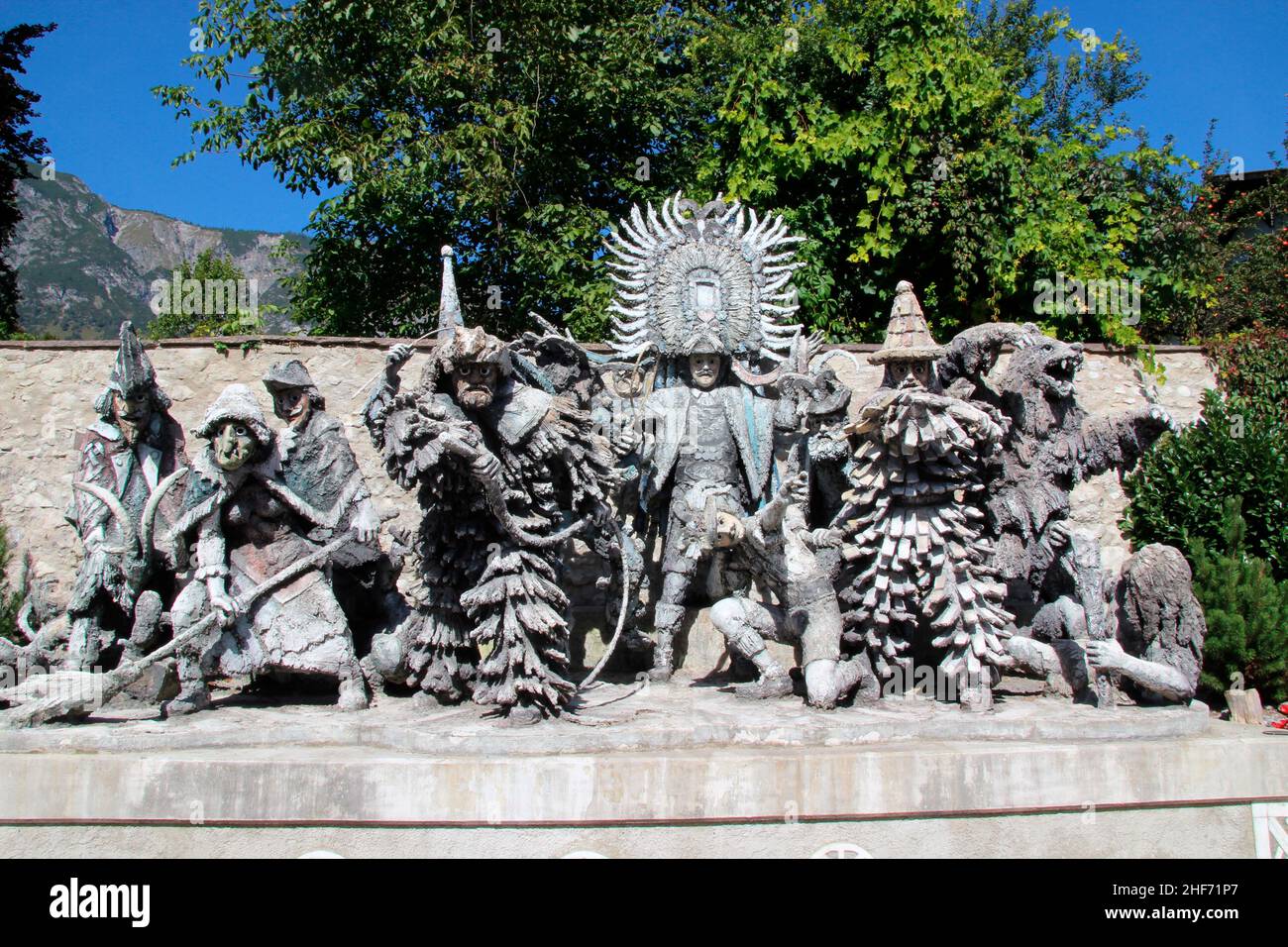 Monument Fasching Matschgererfiguren designed by Sigfried Obleitner 2017,  consisting of witches,  Zottlern,  Zaggelern,  Flecklern,  Flietschelern,  Klötzlern,  Hiatltuxern and the Spiegel- or Bandltuxer Austria,  Tyrol,  Absam, Stock Photo