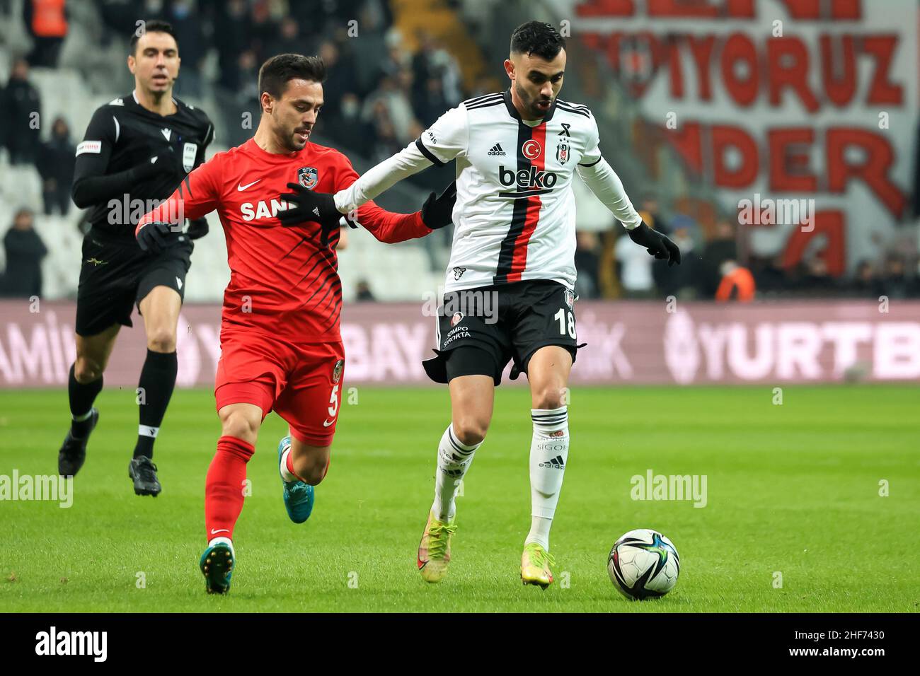 Istanbul, Turkey. 14th Jan, 2022. ISTANBUL, TURKEY - JANUARY 14: Furkan  Soyalp of Gaziantep FK challenges Rachid Ghezzal of Besiktas JK during the  Turkish Super Lig match between Besiktas and Gaziantep FK