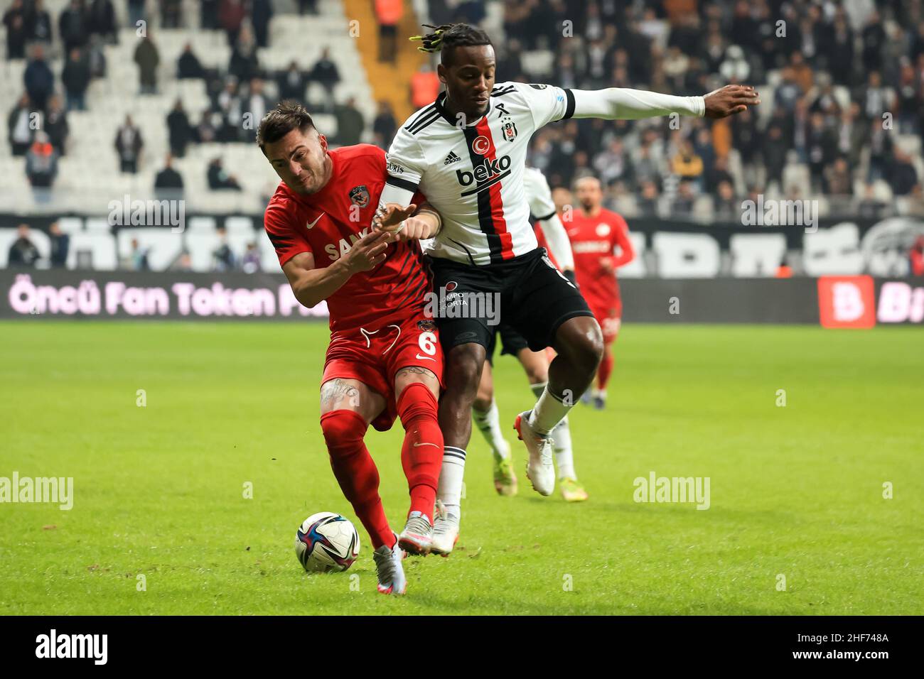 Istanbul, Turkey. 14th Jan, 2022. ISTANBUL, TURKEY - JANUARY 14: Alin Tosca  of Gaziantep FK and Michy Batshuayi of Besiktas JK battle for possession  during the Turkish Super Lig match between Besiktas