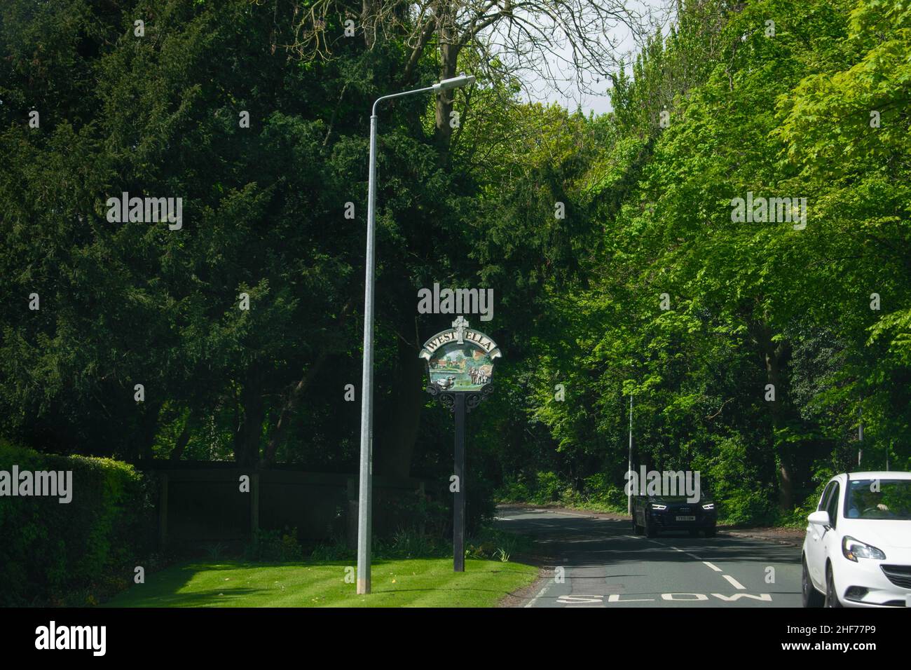 Road sign on street directing to West Ella, Kirk Ella, in Kingston upon