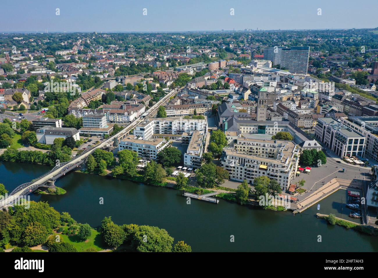 Muelheim an der Ruhr,  North Rhine-Westphalia,  Germany - Stadtuebersicht Muelheim an der Ruhr,  in front the MueGa-Park,  in the back the city with residential buildings,  business buildings,  the new marina and the town hall tower,  on the left the new cycle expressway,  the cycle highway RS1. Stock Photo