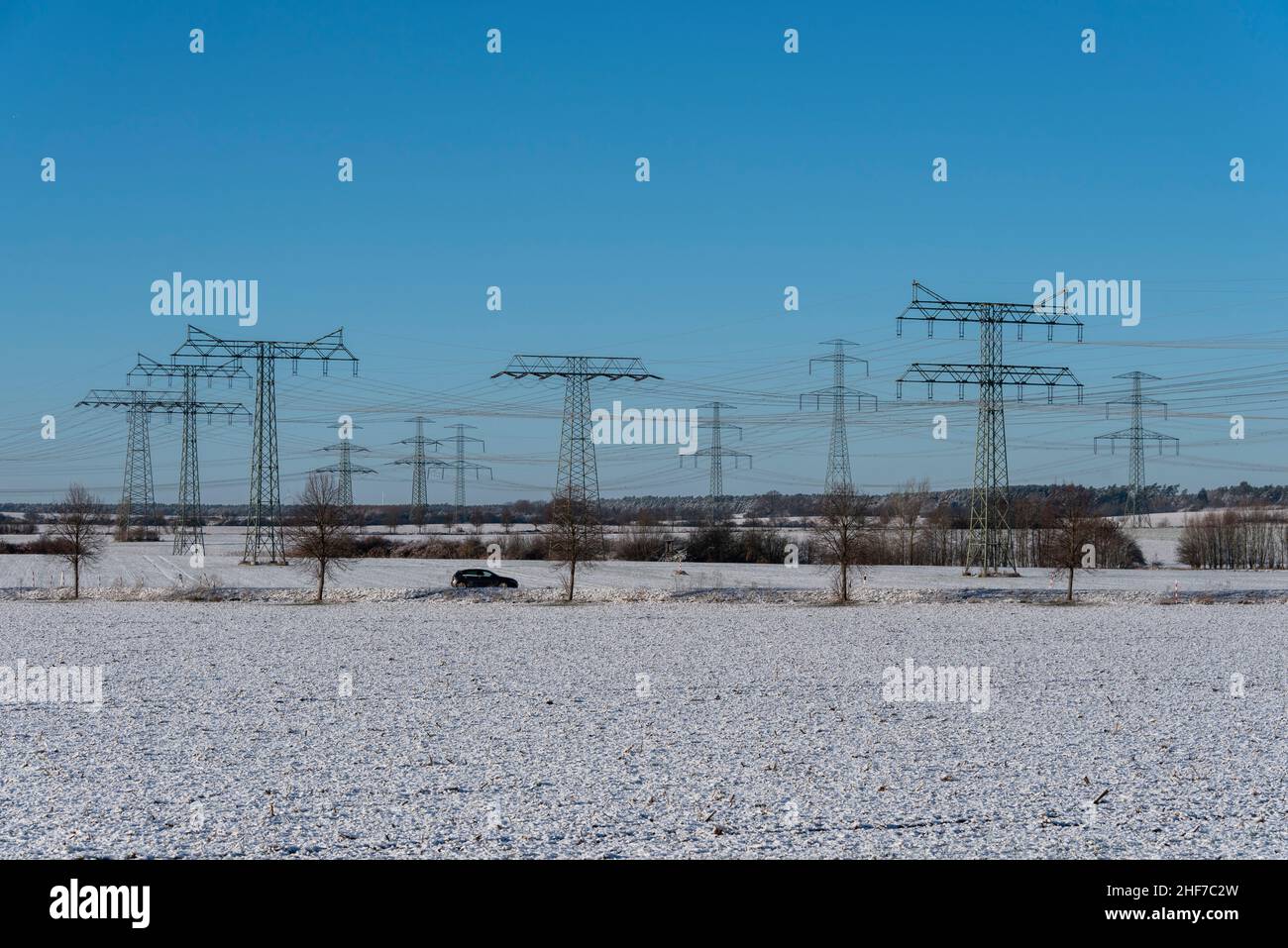 Germany,  Saxony-Anhalt,  heavy current pylons,  winter landscape Stock Photo