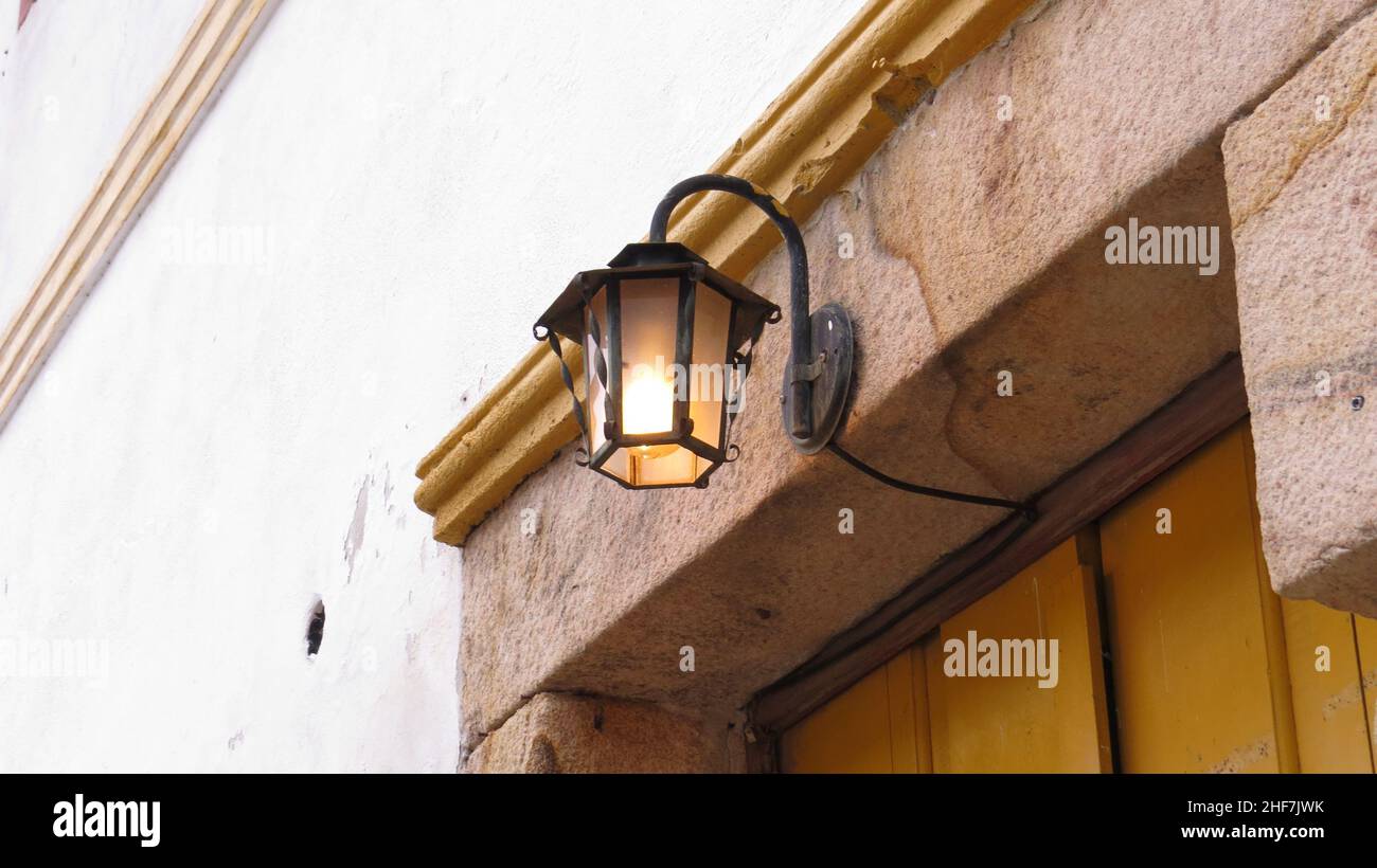 Lamp in stone colonial portal Stock Photo