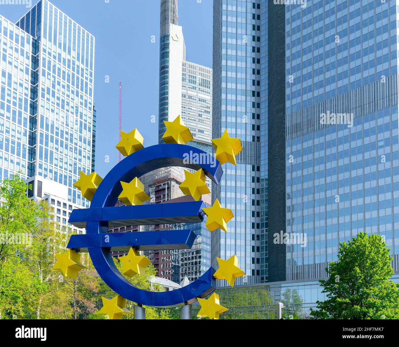 Euro symbol /sign outside the business banking central European bank sky scrapers in Main Hatten Frankfurt on a summers day Stock Photo