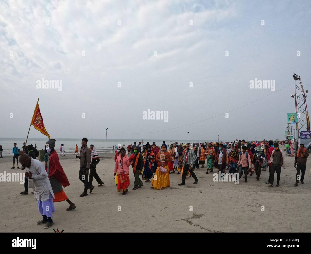 Kolkata, India. 13th Jan, 2022. Hindu devotees arrive during the Gangasagar Mela festival, at Sagar Island, some 150 km south of Kolkata, India, on January 13, 2022. (Photo by Dipa Chakraborty/Pacific Press/Sipa USA) Credit: Sipa USA/Alamy Live News Stock Photo